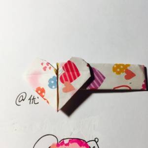 情人节的小惊喜 折纸爱心发卡的制作威廉希尔中国官网
