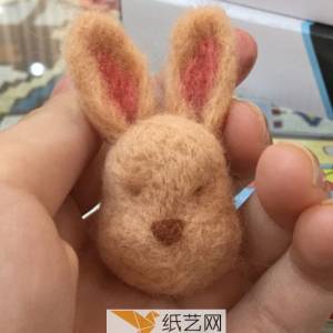 一个小兔子头的羊毛毡新手威廉希尔中国官网
