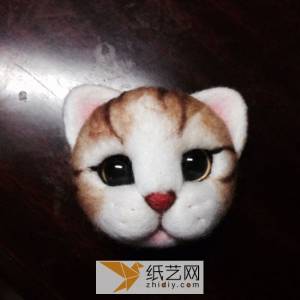 羊毛毡制作的小猫头的威廉希尔中国官网
 准备好的新年礼物