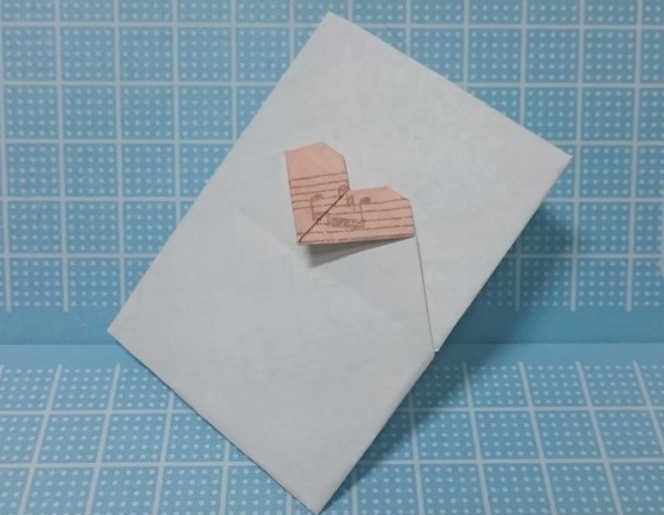 七夕情人节简单折纸心小信封的制作威廉希尔中国官网
