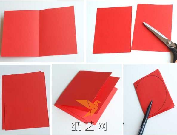 我们先来制作红苹果的立体贺卡，先来将红色的纸剪裁成合适的大小，然后对折，在上面画上一半的苹果