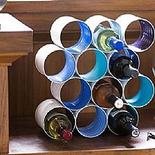 废物利用易拉罐旧罐子制作红酒架的威廉希尔中国官网
图解